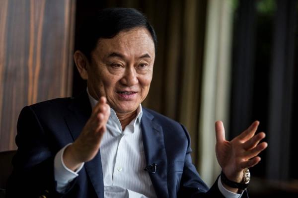 Ex-PM Thaksin to return to Thailand next month, says daughter
